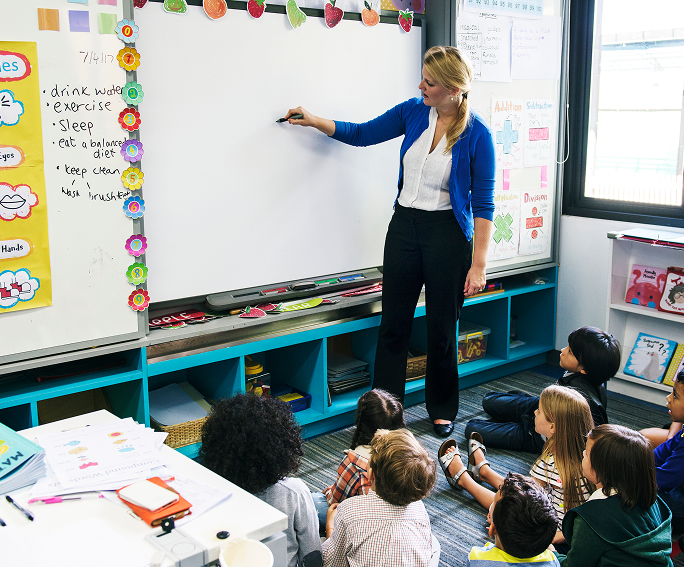 Teacher leading a classroom session with students
